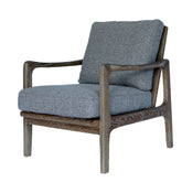 Estrid Accent Armchair featuring solid oak frame, bouclé-style grey fabric with silk underlay, angled ladder-back design, and 4.2 layers of foam for modern comfort and elegance.